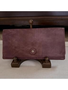 Vintage Wanderlust burgundy leather passport / travel wallet with plaid lining.